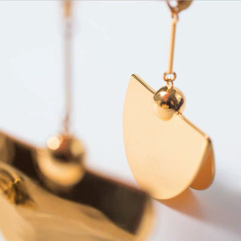 Coppery stud earrings