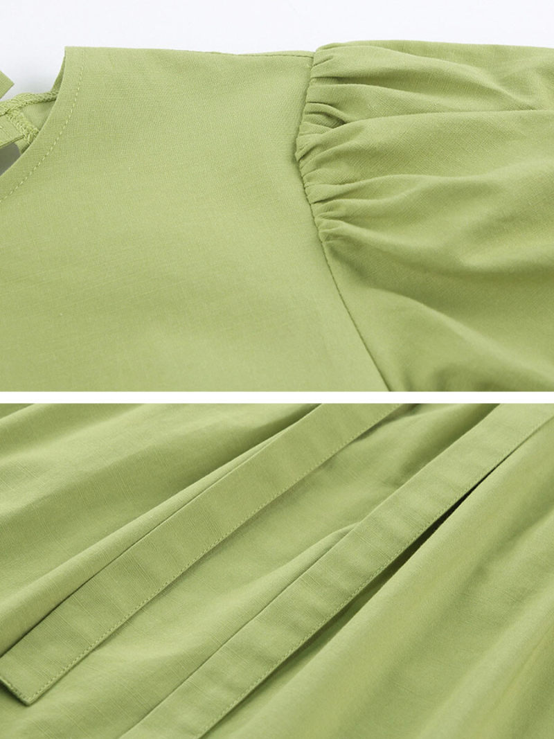 Crew Neck Backless Mini Dress With Tie Details On Neck