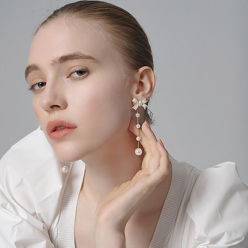 Bow earrings with pearl and chain drop design d925 doop