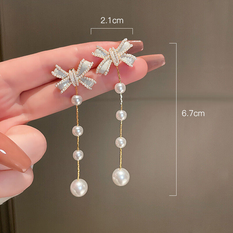 Bow earrings with pearl and chain drop design d925 doop