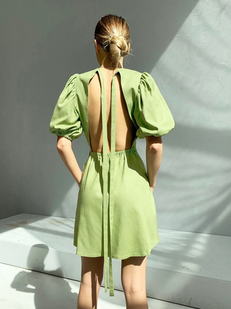 Crew Neck Backless Mini Dress With Tie Details On Neck