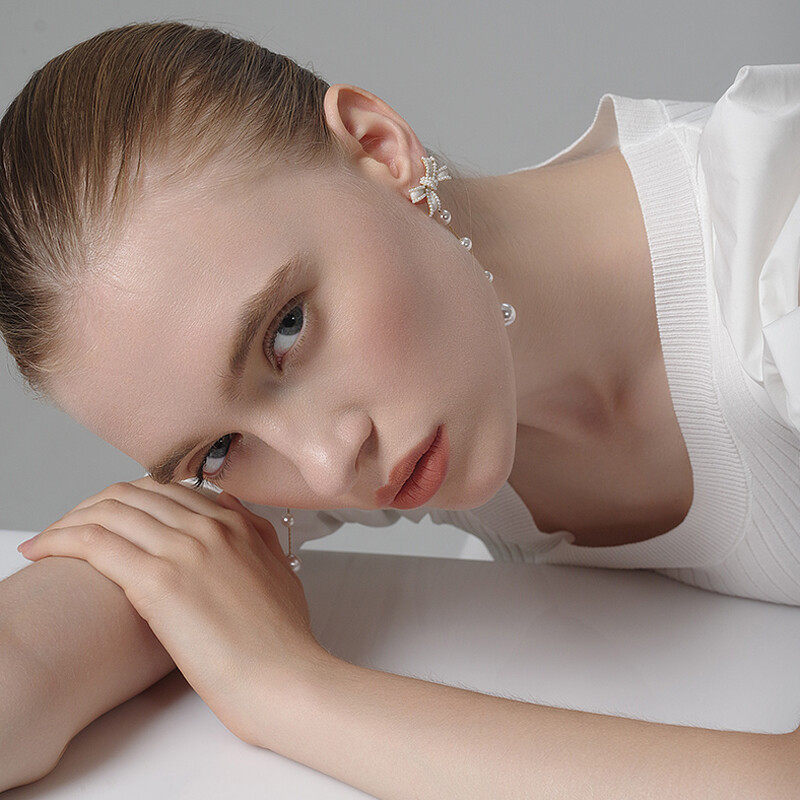 Bow earrings with pearl and chain drop design d925 doop