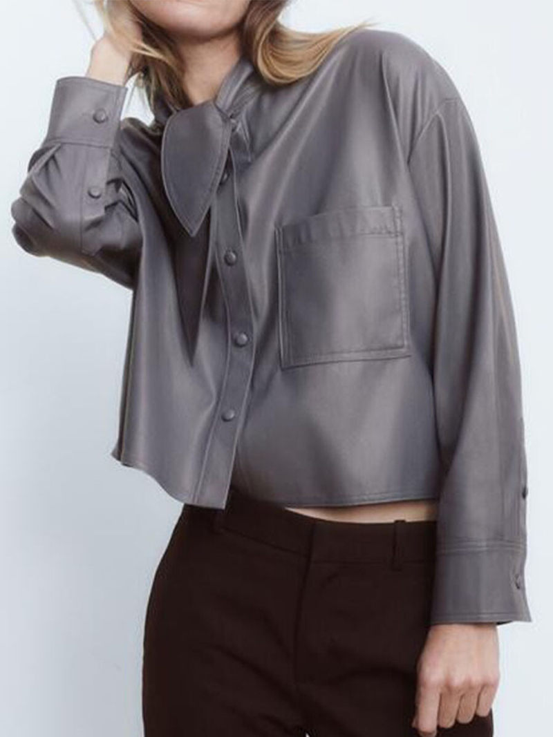 Bowknot is acted the role of imitation leather shirt
